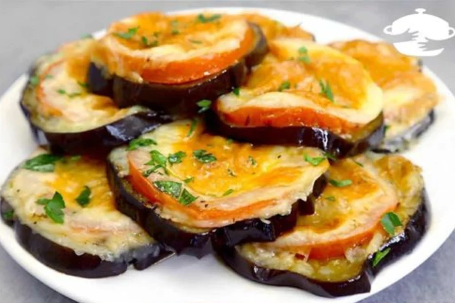 Berinjela assada com tomate e queijo